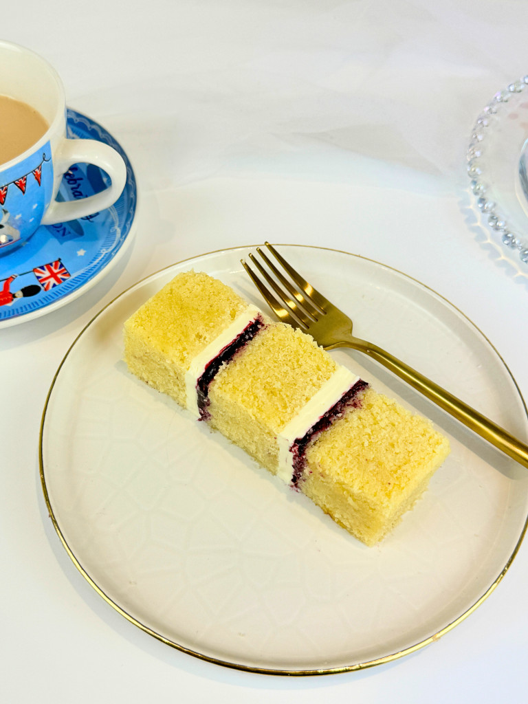 Light and tender crumbs vanilla cake slices with mixed fruits fillings.