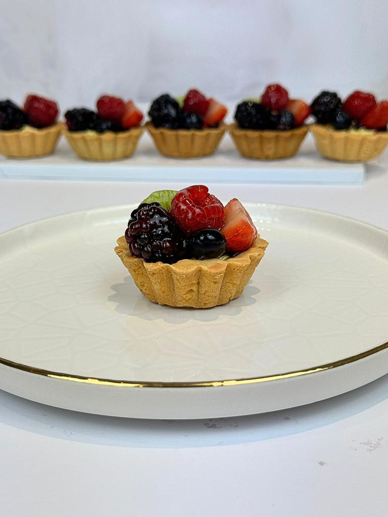 Fruit tartlets - Topped with fresh seasonal fruits.