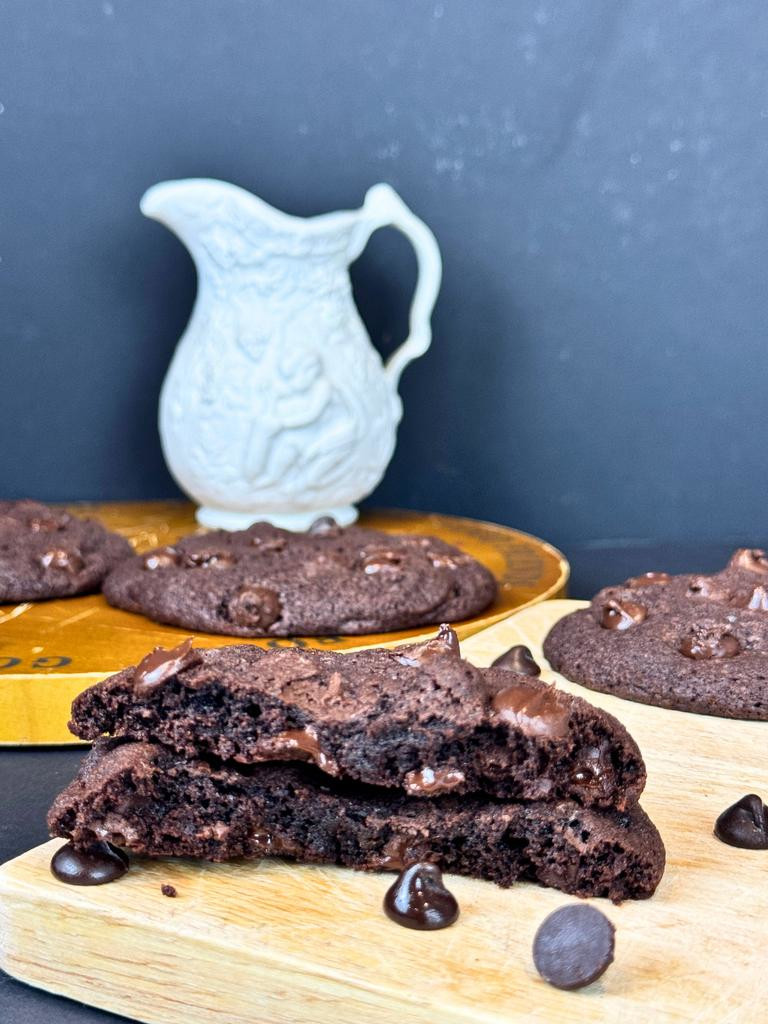 Ooey gooeye chewy andcrispy edge dark chocolate chip cookies.